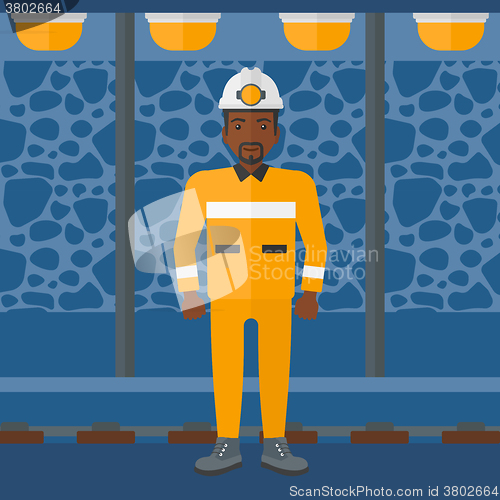 Image of Confident miner in hardhat.