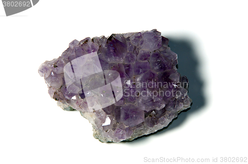 Image of dark purple amethyst on white