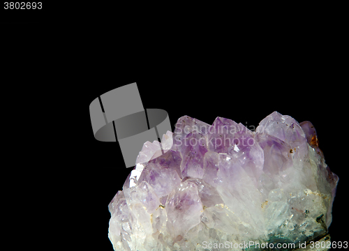 Image of dark purple amethyst over black