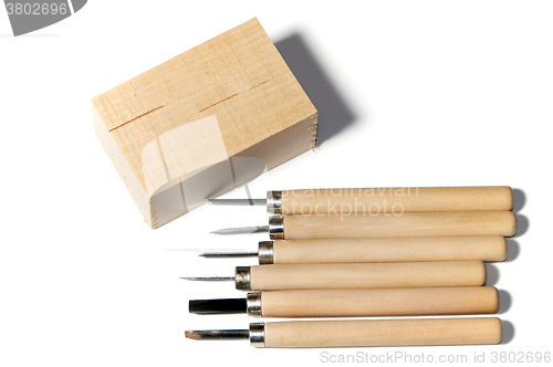 Image of wood carving tools and basswood
