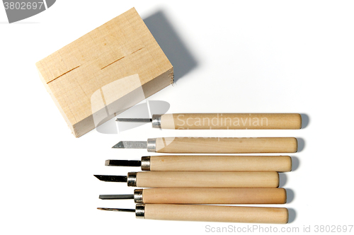 Image of wood carving tools with basswood