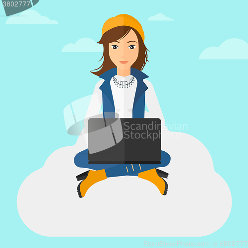 Image of Woman working on laptop.