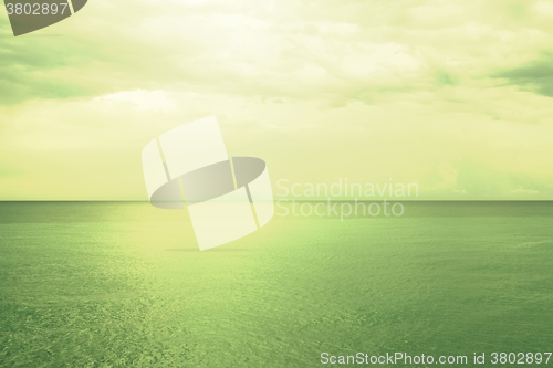 Image of Retro style image of sea and sky