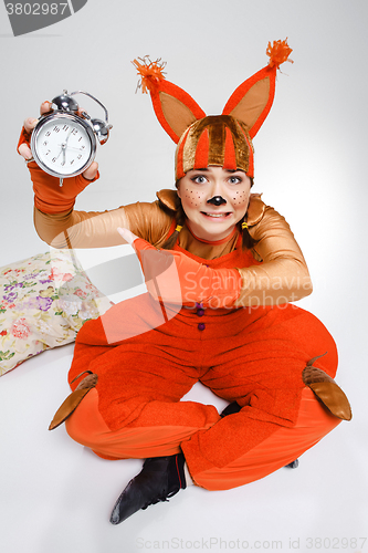 Image of Young woman in the image of red squirrel 