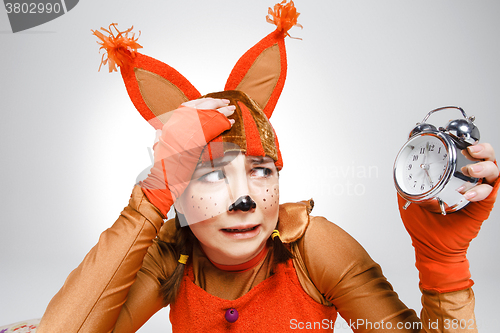 Image of Young woman in the image of red squirrel 