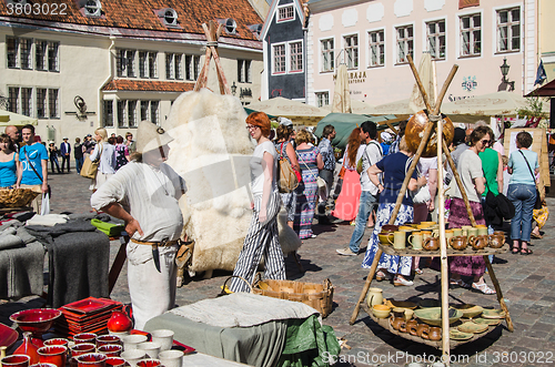 Image of Master crafts sell their products on the medieval market