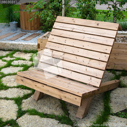 Image of Wooden garden armchair, close up