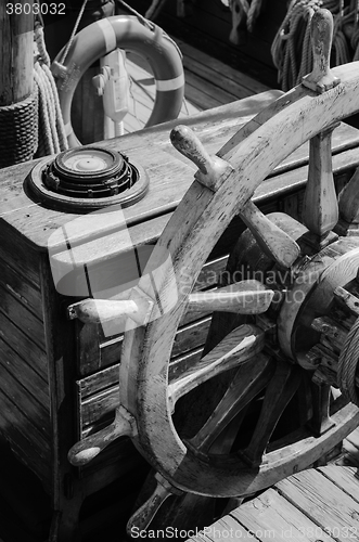 Image of Steering wheel of an old sailing vessel, close up