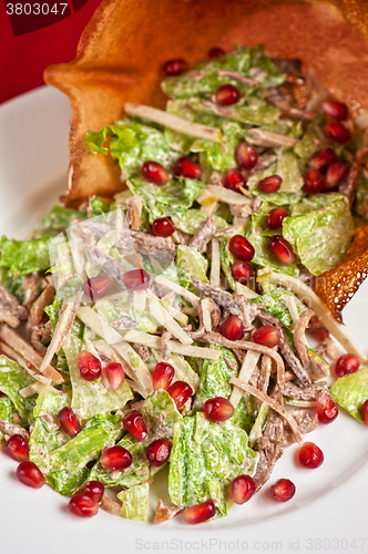 Image of meat and pomegranate salad 