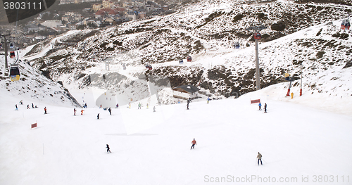 Image of View from a ski lift of skiers below on run