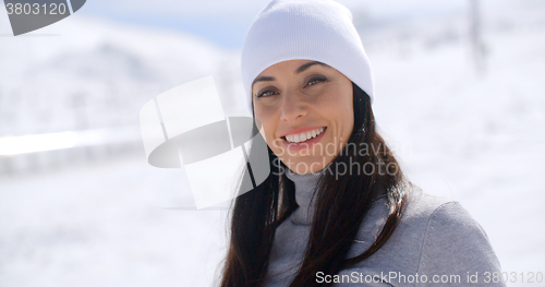 Image of Gorgeous young woman in a snowy landscape