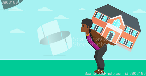 Image of Man carrying house.