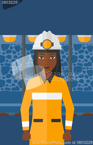 Image of Confident miner in hardhat.