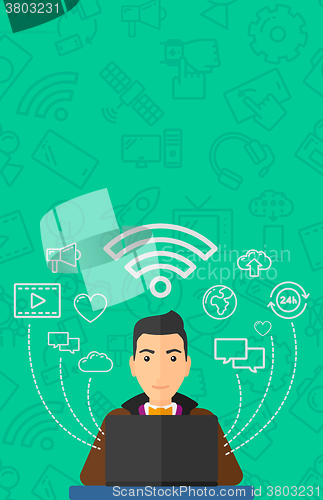 Image of Man working on laptop.