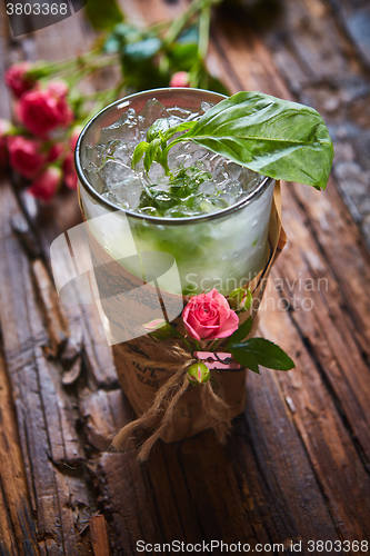 Image of fresh mojito on a rustic table