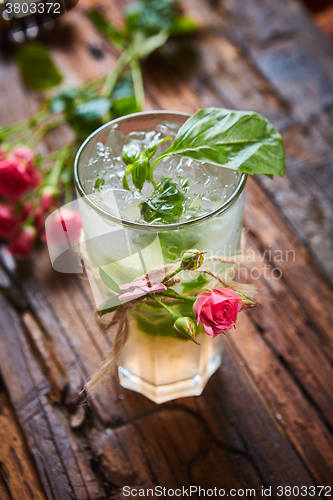 Image of fresh mojito on a rustic table