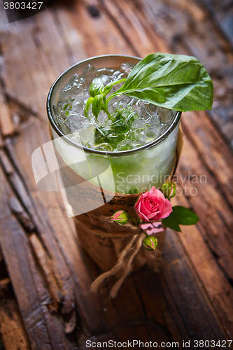 Image of fresh mojito on a rustic table