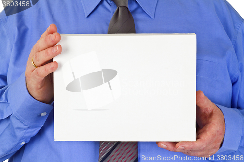 Image of Businessman with blank white card