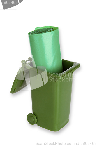 Image of Garbage can with green trash bags