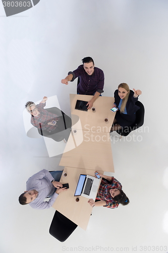 Image of aerial view of business people group on meeting