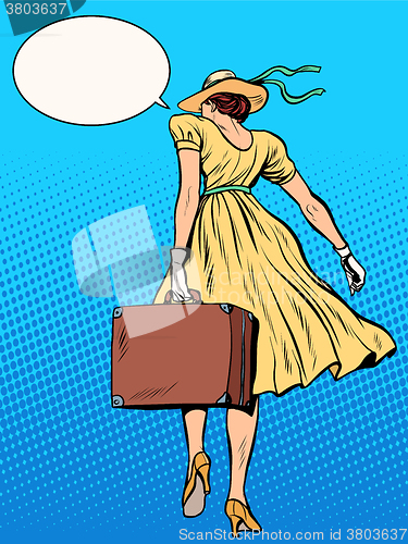 Image of Lady traveler with suitcase