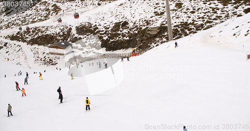 Image of View from a ski lift of skiers below on run