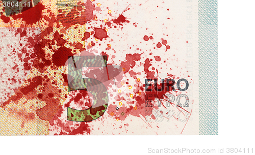 Image of Close-up of a 5 euro bank note, stained with blood