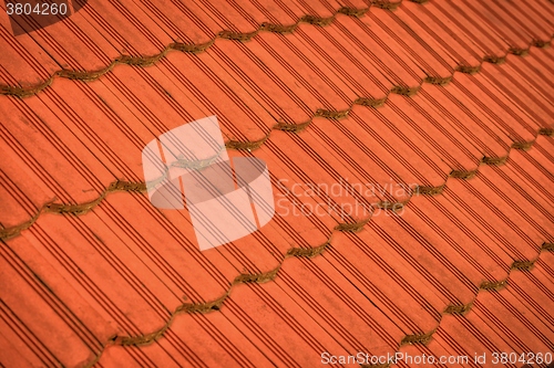 Image of Roof tile over blue sky