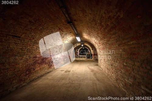 Image of Long underground brick tunnel angle shot