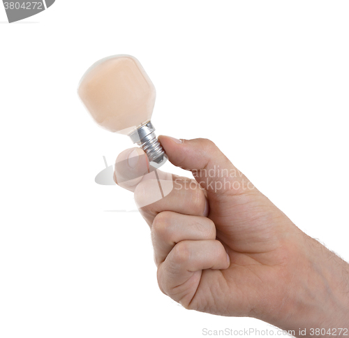 Image of Hand holding an light bulb 