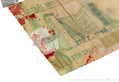 Image of 5 Gambian dalasi bank note, bloody