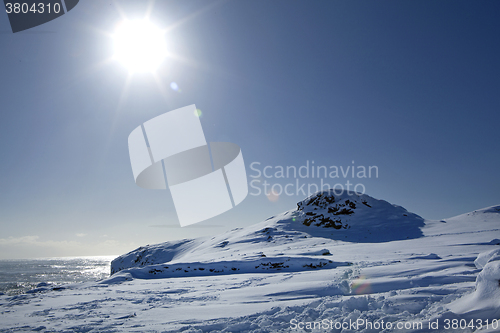 Image of Winter landscape with blue sky