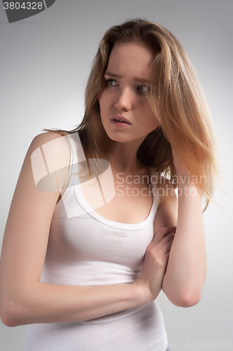 Image of Attractive sad woman