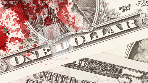 Image of US one Dollar bill, close up, blood