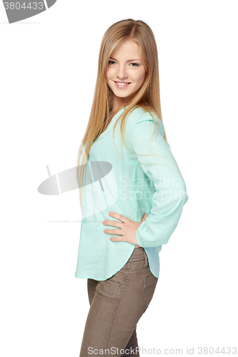 Image of Blond female in mint color shirt