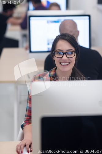 Image of startup business, woman  working on desktop computer