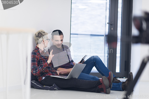 Image of startup business, couple working on laptop computer at office