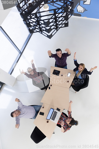 Image of aerial view of business people group on meeting