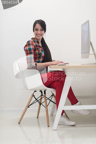 Image of startup business, woman  working on desktop computer