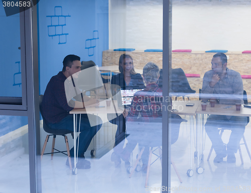 Image of startup business team on meeting at modern office