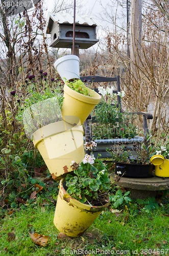 Image of one arrangement with garden pots and flowers