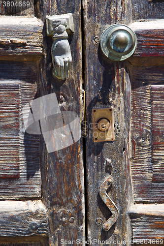 Image of knocker castle lock  lanzarote  door wood   the red brown 