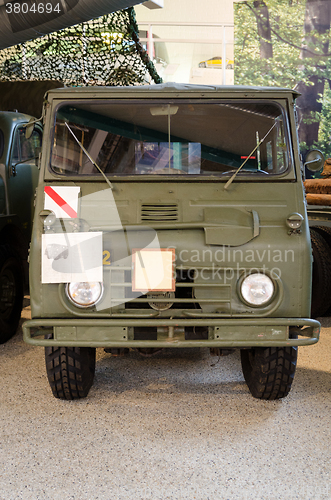 Image of one old swedish military green car