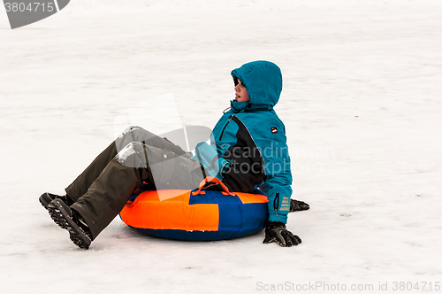 Image of Baby winter sledding on the Ural River
