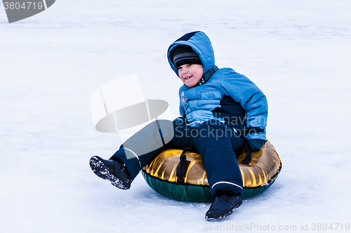 Image of Baby winter sledding on the Ural River