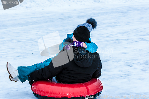 Image of Baby winter sledding on the Ural River