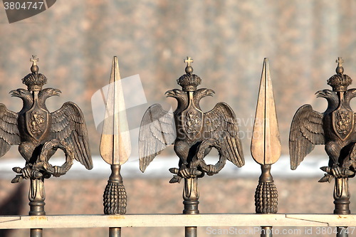 Image of double-headed eagle on the fence