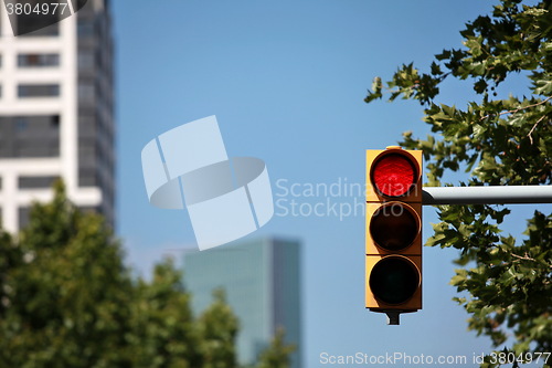 Image of red traffic light in the city