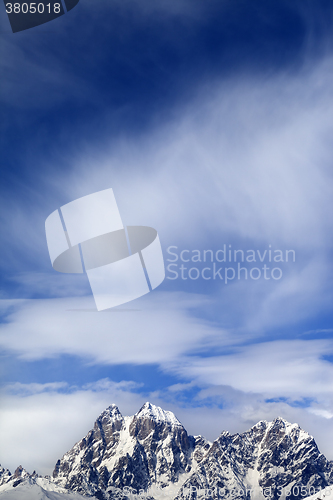 Image of Mounts Ushba and Chatyn in windy sunny day