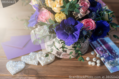 Image of beautiful bouquet flowers and hearts 